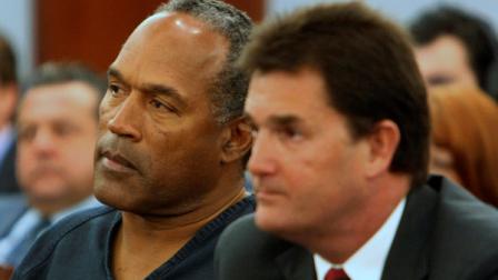 FILE - This Jan. 16, 2008 file photo shows O.J. Simpson, left, and his lawyer Yale Galanter listen during a hearing in Las Vegas. A Nevada judge will take testimony and evidence on former football star O.J. Simpsons claim that he was so badly represented in his Las Vegas armed robbery and kidnapping trial that he should be freed from prison and get another trial. (AP Photo/Gary Thompson, Pool, File)