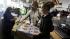 Heather Griffiths, right, helps her mother Dori...