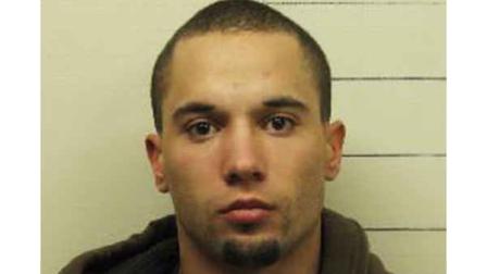 This booking photo provided by Boise Police Department shows Michael J. Watkins on Monday, Nov. 19, 2012. Police in Idaho say Watkins, 22, is facing felony burglary and grand theft charges after the death of a monkey at the Boise zoo. The patas monkey was found dead of blunt force trauma to the head and neck early Saturday morning, shortly after a zoo security guard frightened away two male intruders. (AP Photo/Boise Police Department)