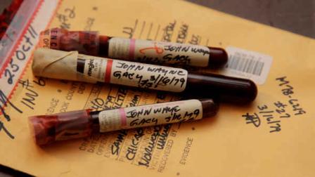 This photo taken Friday, Nov. 30, 2012, in Chicago shows three vials of mass murderer John Wayne Gacys blood recently discovered by Cook County Sheriffs detective Jason Moran. (AP Photo/M. Spencer Green)
