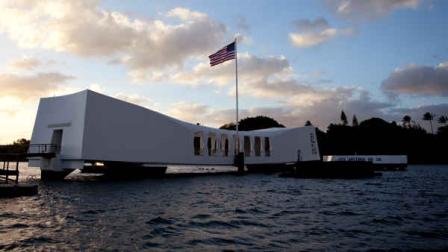 The USS Arizona Memorial, part of the World War II Valor in the Pacific National Monument, is seen at sunset, Thursday, Dec. 29, 2011, in Pearl Harbor, Hawaii. (AP Photo/Carolyn Kaster)