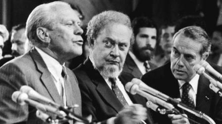 FILE - In this Sept. 15, 1987 file photo, former President Gerald Ford, left, introduces Supreme Court Associate Justice nominee Robert Bork, as the Senate Judiciary Committee began confirmation hearings on the nomination on Capitol Hill. Ford praised Bork as being uniquely qualified for the post. At right is Sen. Robert Dole, R-KS, who also made a statement on Bork. Robert Bork, whose failed Supreme Court nomination made history, has died. (AP Photo/Charles Tasnadi)