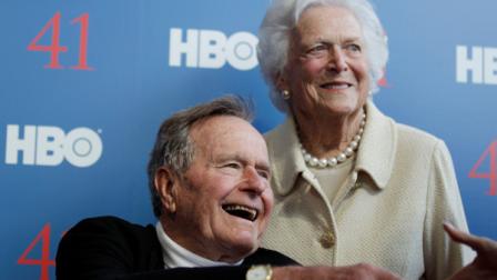 FILE - In a Tuesday, June 12, 2012 file photo, former President George H.W. Bush, and his wife, former first lady Barbara Bush, arrive for the premiere of HBOs new documentary on his life near the family compound in Kennebunkport, Maine. Bush spokesman Jim McGrath said Wednesday, Dec. 26. 2012 that doctors at the Houston hospital where Bush has been treated for a month remain cautiously optimistic that he will recover. Still, no discharge date has been set, and McGrath says that doctors are being cautious because at Bushs age sometimes issues crop up that are beyond anybodys ability to discern or foretell.(AP Photo/Charles Krupa, File)