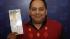 Poisoned lottery winner autopsy confirms... :: This undated photo provided by the Illinois Lottery shows Urooj Khan, 46, of Chicagos West Rogers Park neighborhood, posing with a winning lottery ticket. The Cook County medical examiner said Monday, Jan. 7, 2013, that Khan was fatally poisoned with cyanide July 20, 2012, a day after he collected nearly $425,000 in lottery winnings. (AP Photo/Illinois Lottery)