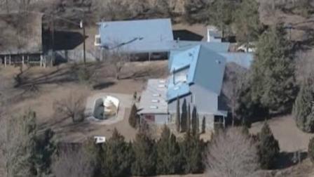 A 15-year-old boy remained in custody Sunday night as detectives tried to piece together what led to the shooting of five people, including three young children, who were found dead in a New Mexico home.