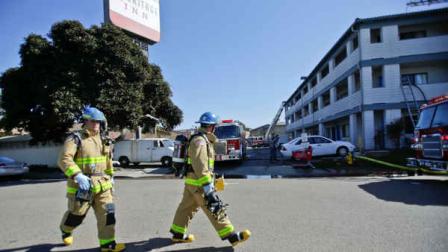 Firefightersrespond to the Heritage Hotel after an explosion on Wednesday, Jan. 30, 2013, in San Diego. The cause of the explosion is under investigation. Three people were injured in the explosion at the hotel near SeaWorld San Diego and investigators were trying to determine whether there was a drug lab inside, authorities said. Three people were taken to a hospital to be treated for burns and one was in serious condition, said San Diego Fire-Rescue Department spokesman Maurice Luque. (AP Photo/Lenny Ignelzi)