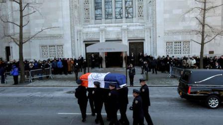 The casket containing the body of former New York City Mayor Ed Koch is brought into a synagogue for his funeral in New York, Monday, Feb. 4, 2013. Koch died Friday of congestive heart failure at age 88. (AP Photo/Seth Wenig)
