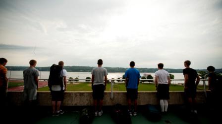 In this photo provided by the U.S. Coast Guard, members of the incoming class of 2016 stand in a line and await instructions at the U.S. Coast Guard Academy Monday, June 25, 2012, in New London, Conn. In all, 251 members, known as swabs, reported in during an event called R-Day or Reporting In Day. Each year the Academy accepts incoming freshmen for R-Day, which marks the start of a military career as future officers of the U.S. Coast Guard and indoctrinates them to military life. (AP Photo/U.S. Coast Guard, NyxoLyno Cangemi)