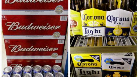 This combination of Associated Press file photos show Budweiser beer in the aisles of Elite Beverages in Indianapolis, and Constellation Brands Corona beers displayed at a liquor store in Palo Alto, Calif. The Justice Department on Thursday, Jan. 31, 2013, filed a lawsuit to stop Anheuser-Busch InBevs proposed $20.1 billion purchase of Mexican brewer Grupo Modelo, which would unite the ownership of popular beers like Budweiser and Corona. (AP Photos)