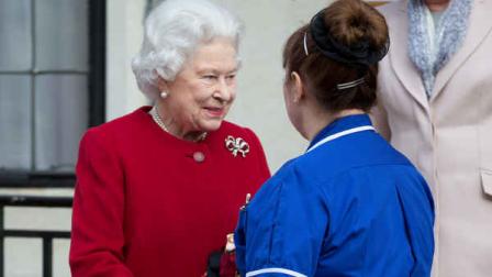 Britains QueenElizabeth II, left, shakes hands with the head nurse at the King Edward VII hospital following a one-day stay caused by a stomach ailment, London Monday, March 4, 2013. The 86-year-old queen fell ill Friday and was being treated at Windsor Castle until Sunday, when she was moved to a central London hospital as a precaution. (AP Photo/Alastair Grant)