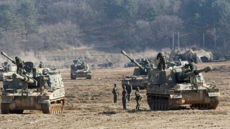 South Korean Army soldiers work on their K-9 self-propelled artillery vehicles during an exercise against possible attacks by North Korea near the border village of Panmunjom in Paju, South Korea, Monday, March 11, 2013. South Korea and the U.S. on Monday kicked off an annual military drill amid worries about a possible bloodshed following North Koreas threat to scrap a decades-old war armistice and launch a nuclear attack on the U.S.