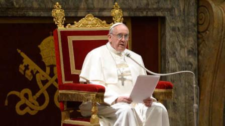 In this photo made available by the Vatican newspaper LOsservatore Romano, PopeFrancis delivers his speech as he meets the Cardinals for the first time after his election, at the Vatican, Friday, March 15, 2013. (AP Photo/LOsservatore Romano, ho)