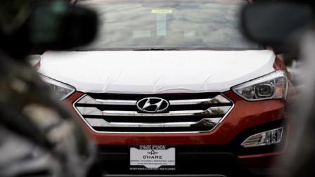 A Hyundai Sonata is seen outside of a Hyundai car dealership on Thursday, Oct. 4, 2012., in Des Planines, Ill. For nearly two decades, the Toyota Camry and the Honda Accord have ruled the mid-sized car market. But now the dominance is starting to slip. as cars like the Hyundai Sonata, Ford Fusion, Nissan Altima and Kia Optima have cut into sales of the Camry and Accord by offering combinations of sleek designs, luxury-car features and better gas mileage. (AP Photo/Nam Y. Huh)