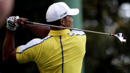 Tiger Woods watches his tee shot on the 14th hole during the second round of the Masters golf tournament Friday, April 12, 2013, in Augusta, Ga. (AP Photo/David Goldman)