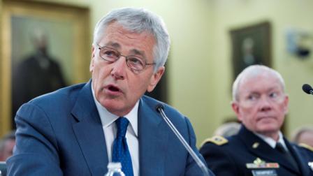 Defense Secretary Chuck Hagel, accompanied by Joint Chiefs Chairman Gen. Martin E. Dempsey, testifies on Capitol Hill, in Washington, Tuesday, April 16, 2013, before the House Defense subcommittee hearing on the Defense Departments fiscal 2014 budget.