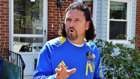 Carlos Arredondo speaks to reporters outside his home while FBI agents waited inside in the Roslindale neighborhood of Boston, Wednesday, April 17, 2013. Arredondo, a peace activist whose son was killed during the Iraq war, was near the explosions and assisted victims after a pair of bombs exploded at the finish line of the Boston Marathon Monday.