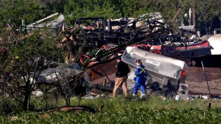 Emergency workers patrol the scene Saturday, April 20, 2013, three days after an explosion at a fertilizer plant in West, Texas. The massive explosion at the West Fertilizer Co. Wednesday night killed at least 14 people and injured more than 160. (AP Photo/Charlie Riedel)