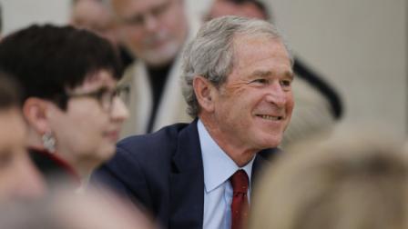 Former President George W. Bush participates in a signing ceremony for the joint use agreement between the National Archives and the George W. Bush Presidential Center Wednesday, April 24, 2013, in Dallas. (AP Photo/David J. Phillip)