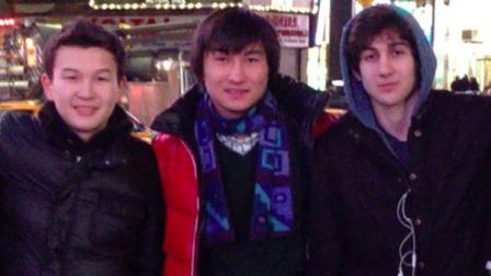 This undated photo added on April 18, 2013 to the VK page of Dias Kadyrbayev shows, from left, Azamat Tazhayakov and Dias Kadyrbayev, from Kazakhstan, with Boston Marathon bombing suspect Dzhokhar Tsarnaev in Times Square in New York. Kadyrbayev and Tazhayakov, two college buddies of Tsarnaev, were jailed by immigration authorities the day after Tsarnaevs capture.