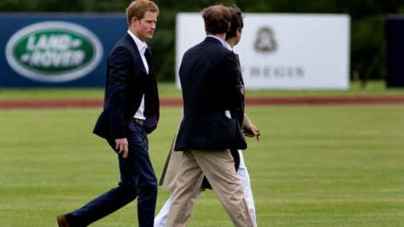 Britains Prince Harry walks across the polo field before the Sentebale Royal Salute Polo Cup charity match in Greenwich, Conn., Wednesday, 15, 2103. Prince Harry is is competing at the Greenwich Polo Club to benefit Sentebale, the charity he co-founded to help poor children and AIDS orphans in the small African nation of Lesotho. (AP Photo/Craig Ruttle)
