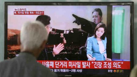 A South Korean man watches a TV news program reporting missile launch conducted by North Korea, at a Seoul train station in Seoul, South Korea, Monday, May 20, 2013. (AP Photo/Lee Jin-man)