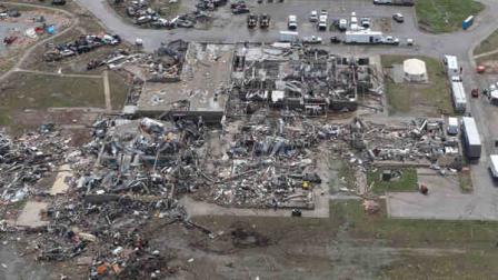 Wreckage of the Plaza Towers Elementary School in Moore, Okla., is pictured from a National Guard helicopter during a tour of tornado damaged areas by Oklahoma Gov. Mary Fallin, Tuesday, May 21, 2013. (AP Photo/Sue Ogrocki, Pool)