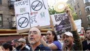 Members of the LGBT community and their supporters gather to speak out after a string a bias attacks, including the fatal shooting of 32-year old Mark Carson on Saturday, during a rally in New Yorks Greenwich Village, Monday, May 20, 2013. A spate of hate-fueled attacks on gay men in New York, including a killing last week on a busy street in one of Manhattans most gay-friendly neighborhoods, has prompted outcry and soul-searching about enduring bias after gay-rights advances in recent years. (AP Photo/Jason DeCrow)  