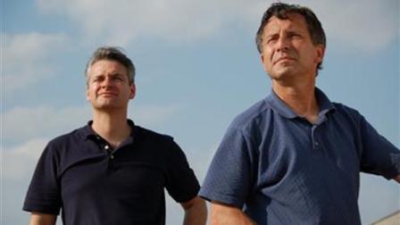 This undated photo provided by The Discovery Channel shows Carl Young and Tim Samaras watching the sky. Jim Samaras said Sunday, June 2, 2013, that his brother storm chaser Tim Samaras was killed along with Tims son, Paul Samaras, and another chaser, Carl Young, on Friday, May 31, 2013 in Oklahoma City. The National Weather Services Storm Prediction Center in Norman, Okla., said the men were involved in tornado research.( AP Photo/Discovery Channel)