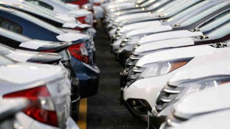 In this Wednesday, Dec. 5, 2012, photo, Honda Civic and Honda CRVs are seen outside of a Honda car dealership in Des Plaines, Ill.(AP Photo/Nam Y. Huh)