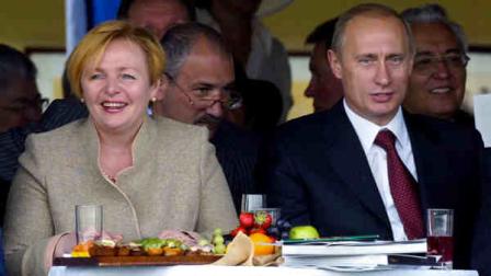 FILE - In this file photo taken on July 3, 2004, President Vladimir Putin and then his wife Lyudmila watch during horse races at the Moscow Central Hippodrome, Russia. Russian President Vladimir Putin and his wife Lyudmila said Thursday, June 6, 2013, they are divorcing after nearly 30 years of marriage, making the announcement on state television after attending a ballet performance at the Kremlin. (AP Photo/Alexander Zemlianichenko, File)