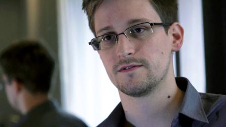 This photo provided by The Guardian Newspaper in London shows Edward Snowden, who worked as a contract employee at the National Security Agency, on Sunday, June 9, 2013, in Hong Kong. (AP Photo/The Guardian)