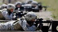 FILE - In this Sept. 18, 2012 file photo, female soldiers from 1st Brigade Combat Team, 101st Airborne Division train on a firing range while testing new body armor in Fort Campbell, Ky., in preparation for their deployment to Afghanistan.   (AP Photo/Mark Humphrey, File)