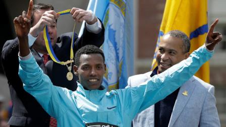 FILE - Lelisa Desisa of Ethiopia reacts during the finish line ceremony after winning the mens division of the 2013 Boston Marathon in Boston Monday, April 15, 2013. (AP Photo/Elise Amendola)