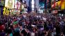 Throngs of marches arrive on Times Square, Sunday, July 14, 2013, in New York, for a protest against the acquittal of volunteer neighborhood watch member George Zimmerman in the 2012 killing of 17-year-old Trayvon Martin in Sanford, Fla. Demonstrators upset with the verdict protested mostly peacefully in Florida, Milwaukee, Washington, Atlanta and other cities overnight and into the early morning. (AP Photo/Craig Ruttle)