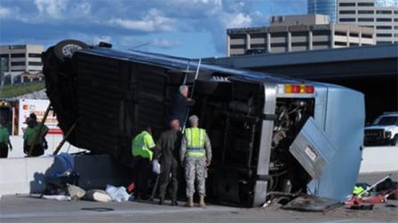 Indiana State Police investigators inspect the underside of a bus that crashed Saturday, July 27, 2013, on Indianapolis far north side while carrying teenagers returning from a summer camp in Michigan. Three people were killed and 26 others were taken to local hospitals following the crash, which occurred when the bus exited an interstate ramp and crashed into a concrete retaining wall. Investigators dont yet know what caused the crash about a mile from its destination, Colonial Hills Baptist Church. (AP Photo/Rick Callahan).