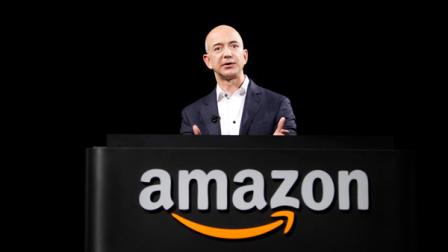FILE - In this Sept. 6, 2012, file photo, Jeff Bezos, CEO and founder of Amazon, speaks at the introduction of the new Amazon Kindle Fire HD and Kindle Paperwhite personal devices, in Santa Monica, Calif. The Washington Post Co. agreed Monday, Aug. 6, 2013, to sell its flagship Washington Post newspaper to Bezos, the founder of Amazon.com for $250 million. (AP Photo/Reed Saxon, File)