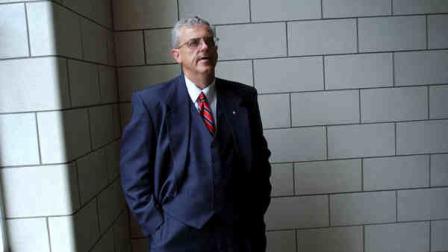 FILE -In this July 2004 file photo, Mingo County Circuit Court Judge Michael Thornsbury stands in a stairwell of the Mingo County Courthouse, in Williamson, W.Va. Federal prosecutors on Thursday, Aug 15, 2013, charged Judge Thornsbury with abusing his power and commandeering a southern West Virginia grand jury in a failed attempt to frame a romantic rival for crimes he didnt commit. (AP Photo/Chris Dorst)