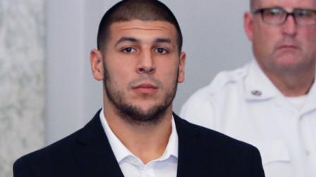 Former New England Patriots NFL football tight end Aaron Hernandez appears during a probable cause hearing at Attleboro District Court, on Wednesday, July 24, 2013, in Attleboro, Mass. (AP Photo/Bizuayehu Tesfaye)