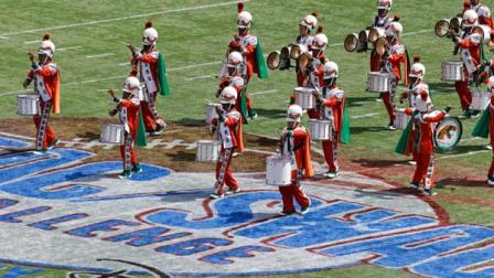 The Florida A&M University band performs at half time Sunday, Sept. 1, 2013, in Orlando, Fla., during FAMUs season-opening football game against Mississippi Valley State, its first appearance in a football stadium in nearly 22 months after the 2011 hazing death of a drum major. All band performances were halted for FAMUs famed Marching 100 shortly after Robert Champion collapsed and died following a hazing ritual on a bus parked at an Orlando hotel in November 2011. (AP Photo/John Raoux)