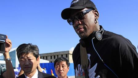 Former NBA star Dennis Rodman arrives at Pyongyang airport, North Korea, Tuesday, Sept. 3, 2013.