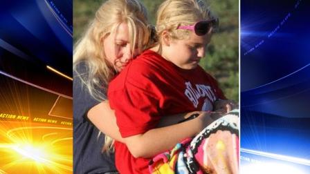 In an undated photo provided by the Stapleton family via the Traverse City Record-Eagle, Issy Stapleton, right, is seen with her mother Kelli in Elberta, Mich. Matt and Kelli Stapleton are deep into the fight of their lives for their daughter Issy. Matt, a Frankfort-Elberta School Districts principal and athletic director, and his wife must battle insurance companies, bureaucracy, and other barriers to secure expensive care they believe is needed for their daughter Issy whose acute autism sometimes spirals into violent outbursts that twice resulted in her mothers hospitalization. (AP Photo/Stapleton Family via Traverse City Record-Eagle)