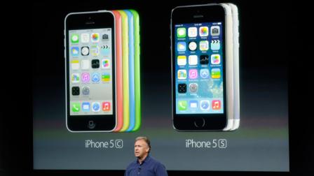 Phil Schiller, Apples senior vice president of worldwide product marketing, speaks on stage during the introduction of the new iPhone 5c and 5s in Cupertino, Calif., Tuesday, Sept. 10, 2013. (AP Photo/Marcio Jose Sanchez)