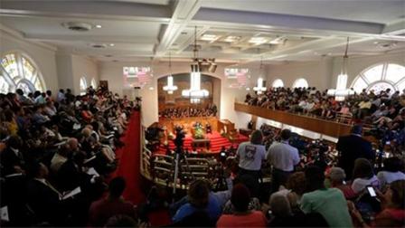 Churchgoers attend services at the 16th Street Baptist Church in Birmingham, Ala., Sunday, Sept. 15, 2013. Sunday marks the 50th anniversary of the bombing of the church by Ku Klux Klan members that killed four young girls on Sept. 15, 1963, and became a landmark moment in the civil rights struggle. (AP Photo/Dave Martin)