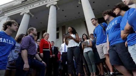 Univ. of Alabama student Khortlan Patterson, center, 19, of Houston, Tex., addresses other students and faculty as they gathered on the steps of the Rose Administration Building to protest the universitys segregated sorority system on the campus in Tuscaloosa, Ala., Wednesday, Sept. 18, 2013. About 400 students and faculty marched across the campus to oppose racial segregation among its Greek-letter social organizations. (AP Photo/Dave Martin)