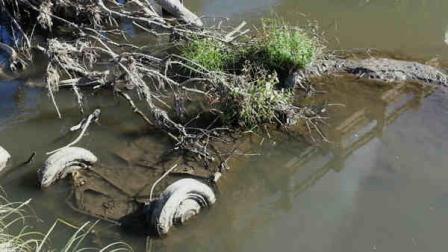An undated photo provided by the South Dakota Attorney Generals Office shows a Studebaker with skeletal remains found in Brule Creek near Elk Point, S.D. (AP Photo/South Dakota Attorney Generals Office)