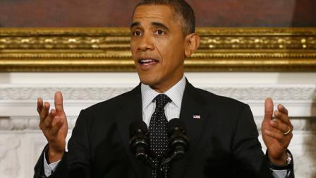 President Barack Obama speaks as he stands with Federal Reserve Chairman Ben Bernanke and Janet Yellen, vice chair of the Board of Governors of the Federal Reserve System, in the State Dining Room at the White House in Washington, Wednesday, Oct. 9, 2013.. (AP Photo/Charles Dharapak)