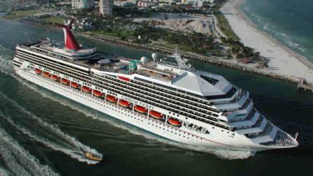 Carnival Cruise Lines newest ship, the 2,758-passenger Carnival Victory, passes by Miami Beach as it embarks on its inaugural Caribbean voyage Sunday, Oct. 15, 2000. The 15th vessel in the Miami-based line s fleet is 893 feet long and its top deck rises 135 feet above the waterline. On-board features include 18 bars and lounges, 1,379 staterooms, a 15,000-square-foot Nautica Spa, four pools, three two-deck-high restaurants and a 24-hour pizzeria. (AP Photo/Andy Newman)
