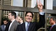 Mark Cuban, Dallas Mavericks NBA basketball team owner and business man, gives a victory sign outside the federal courthouse after a verdict in his inside trading trial in Dallas, Wednesday, Oct. 16, 2013. Jurors said that billionaire Mark Cuban did not commit insider-trading when he sold his shares in an Internet company in 2004 after learning of a development that would dilute the value of his investment. The jury in federal court found that the SEC failed to prove several key elements of its case, including that Cuban traded on nonpublic information. (AP Photo/LM Otero)  