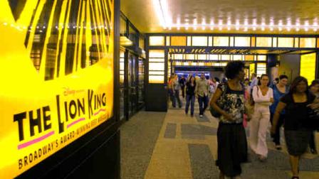 Theater goers pour out of a matinee showing of The Lion King at the Minskoff Theatre in New York, Sunday, May 2, 2010. (AP Photo/David Goldman)