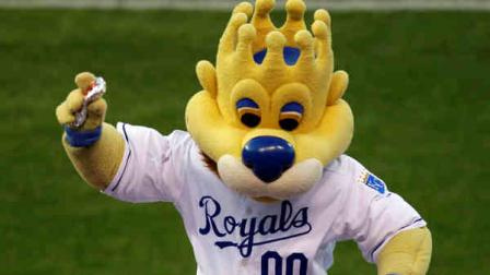 In this Monday, Aug. 24, 2009 photograph, Kansas City Royals mascot Sluggerrr throws hot dogs into the crowd during a baseball game against the Cleveland Indians in Kansas City, Mo. The Missouri Supreme Court is weighing whether a legal standard that protects sports teams from being sued over fan injuries caused by in-game events should also apply to those caused by mascots or other team personnel. (AP Photo/Charlie Riedel)